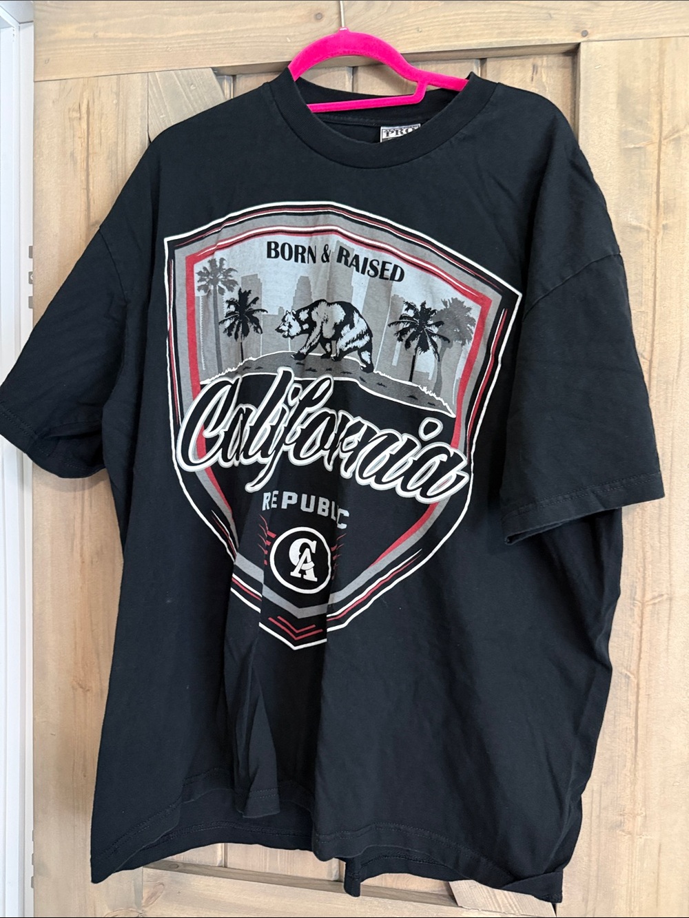 BORN X RAISED Black California Shield Graphic Tee with Red & Gray Accents